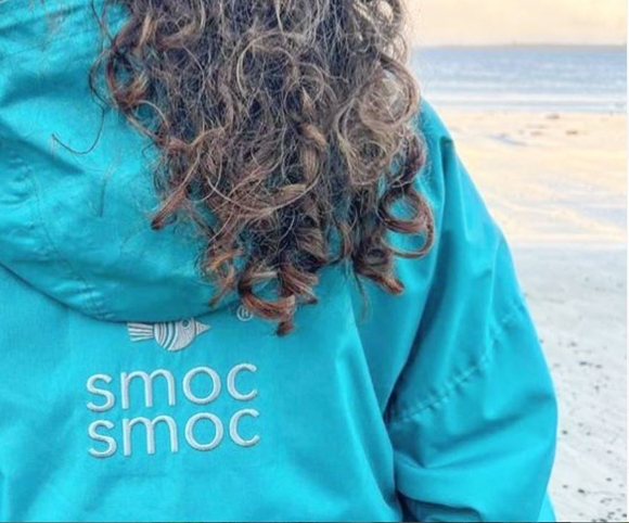 Smoc Smoc - woman wearing smoc on beach
