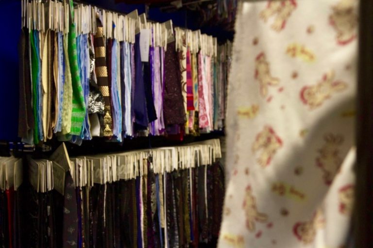 fabric hanging in racks