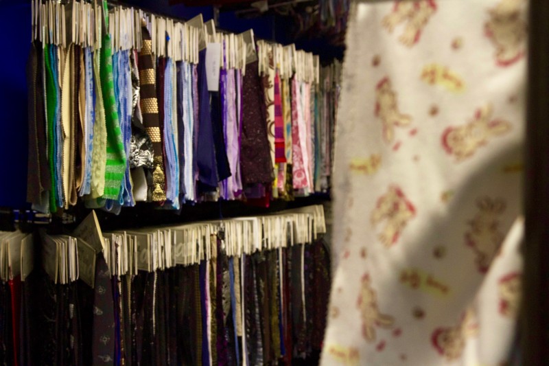 fabric hanging in racks