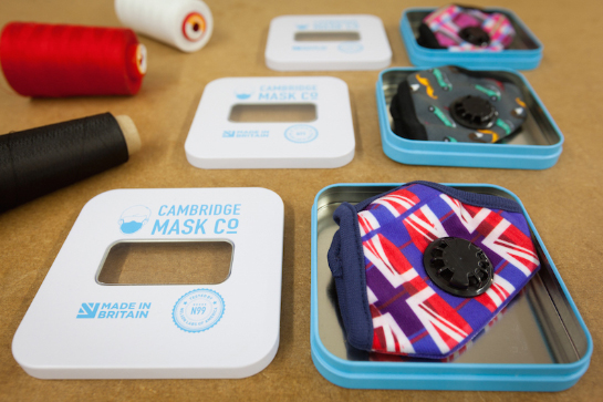 Filtration face masks in their tins, by The Cambridge Mask Company
