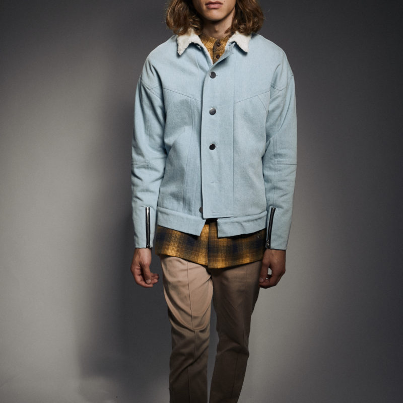 Male model wearing denim jacket, shirt and tailored trouser