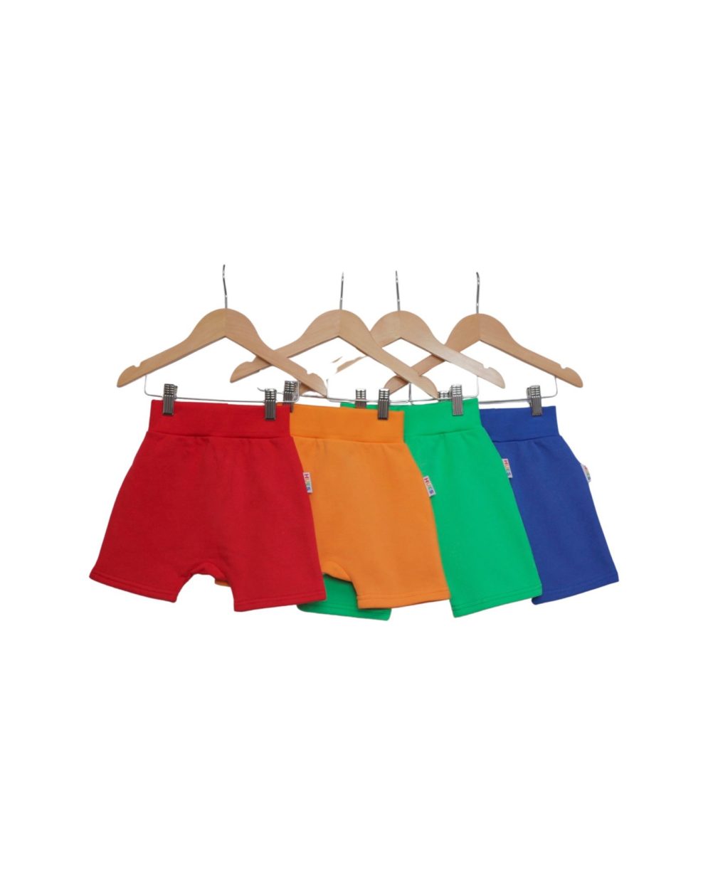 red, orange, green, blue Hues Clothing shorts on hangers
