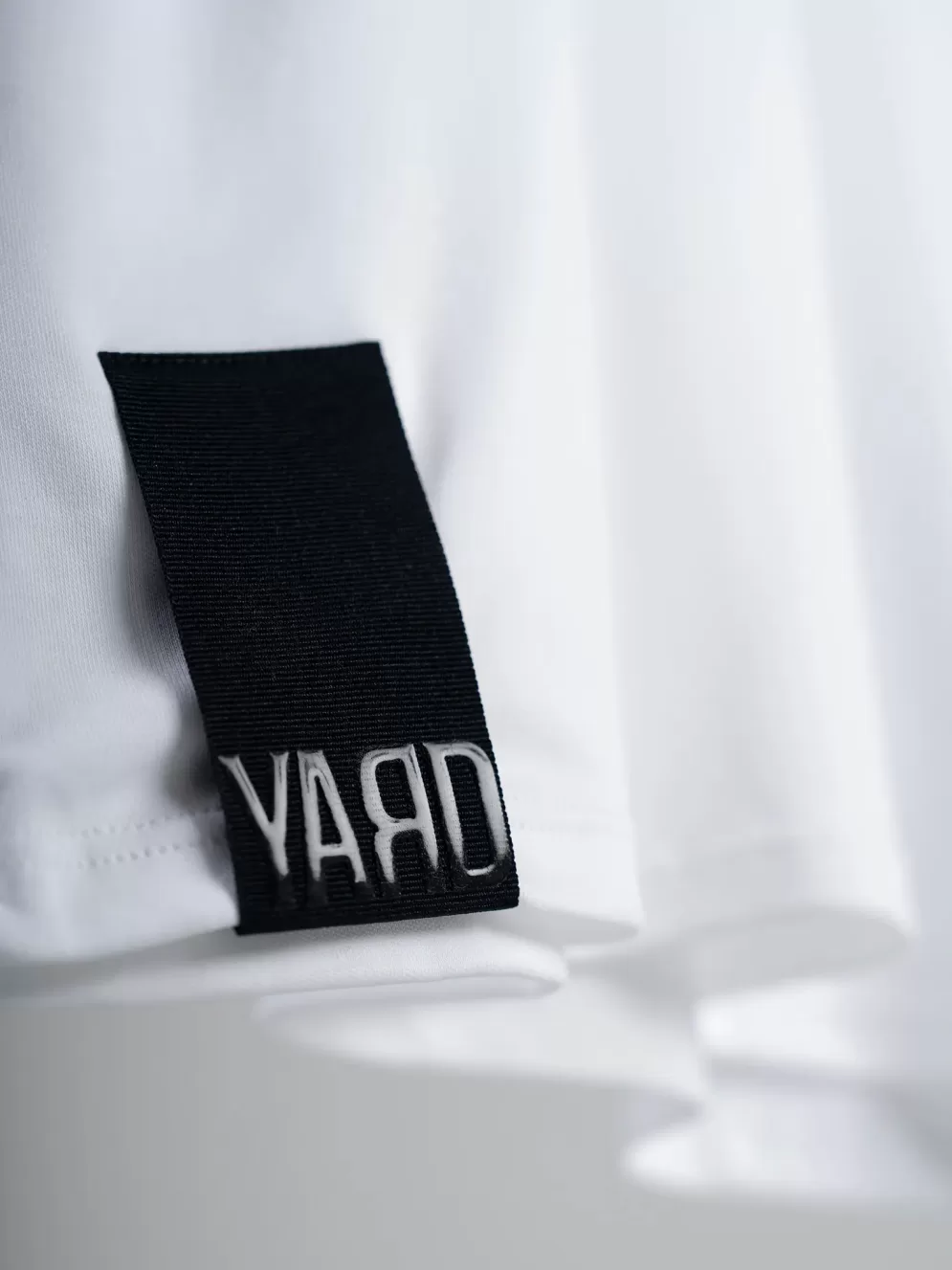 YD OF OVTM WHT hem tag2k